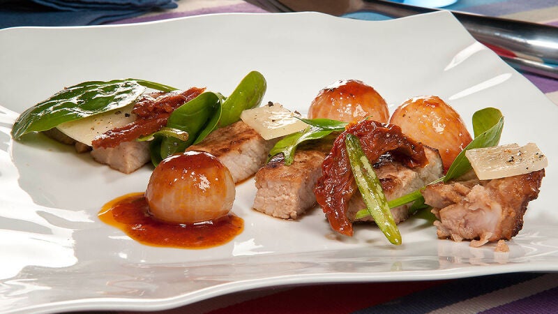 Chuletas de cerdo con cebollitas agridulces