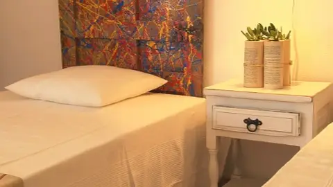 Desván convertido en una habitación para invitados Desván convertido en una habitación para invitados
