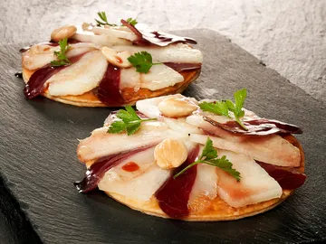 Tostas de melón con jamón de pato Tostas de melón con jamón de pato