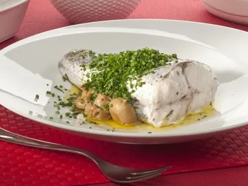 Papillote de merluza con champiñones Papillote de merluza con champiñones